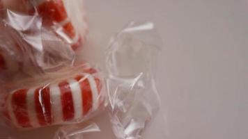 Rotating shot of peppermint candies - CANDY PEPPERMINT 012 video