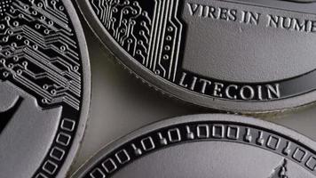 Rotating shot of Litecoin Bitcoins digital cryptocurrency - BITCOIN LITECOIN 0113 video