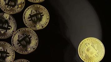 Rotating shot of Bitcoins digital cryptocurrency - BITCOIN 0044 video