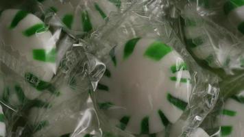 Rotating shot of spearmint hard candies - CANDY SPEARMINT 007 video