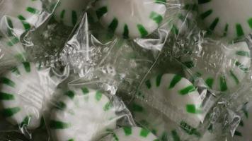 Rotating shot of spearmint hard candies - CANDY SPEARMINT 005 video