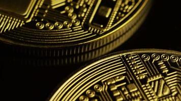 Rotating shot of Bitcoins digital cryptocurrency - BITCOIN 0067 video