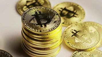 Rotating shot of Bitcoins (digital cryptocurrency) - BITCOIN 0179
