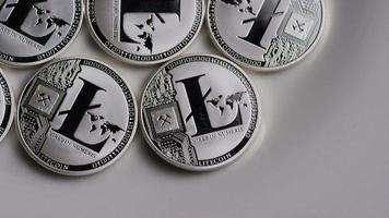 Rotating shot of Litecoin Bitcoins digital cryptocurrency - BITCOIN LITECOIN 0108 video