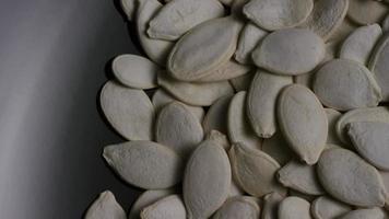 Cinematic, rotating shot of pumpking seeds - PUMPKIN SEEDS 027 video