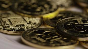 Rotating shot of Bitcoins digital cryptocurrency - BITCOIN 0413 video