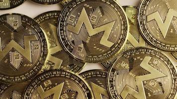 Rotating shot of Bitcoins (digital cryptocurrency) - BITCOIN MONERO 050