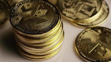 Rotating shot of Bitcoins (digital cryptocurrency) - BITCOIN MONERO 137