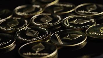 Rotating shot of Bitcoins digital cryptocurrency - BITCOIN ETHEREUM 125 video