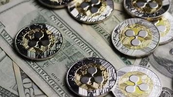 Rotating shot of Bitcoins digital cryptocurrency - BITCOIN RIPPLE 0236 video
