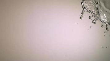 Water splash in ultra slow motion 1,500 fps on a reflective surface - WATER SPLASH 006 video