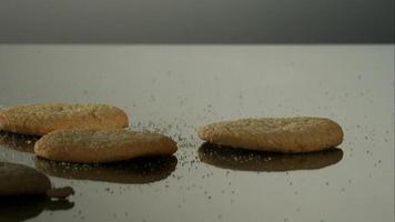Cookies falling and bouncing in ultra slow motion (1,500 fps) on a reflective surface - COOKIES PHANTOM 046