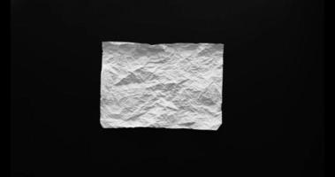 Crumpled white paper stop motion video