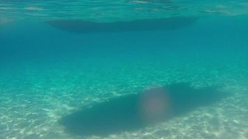 Boat floating with shadow in 4K video