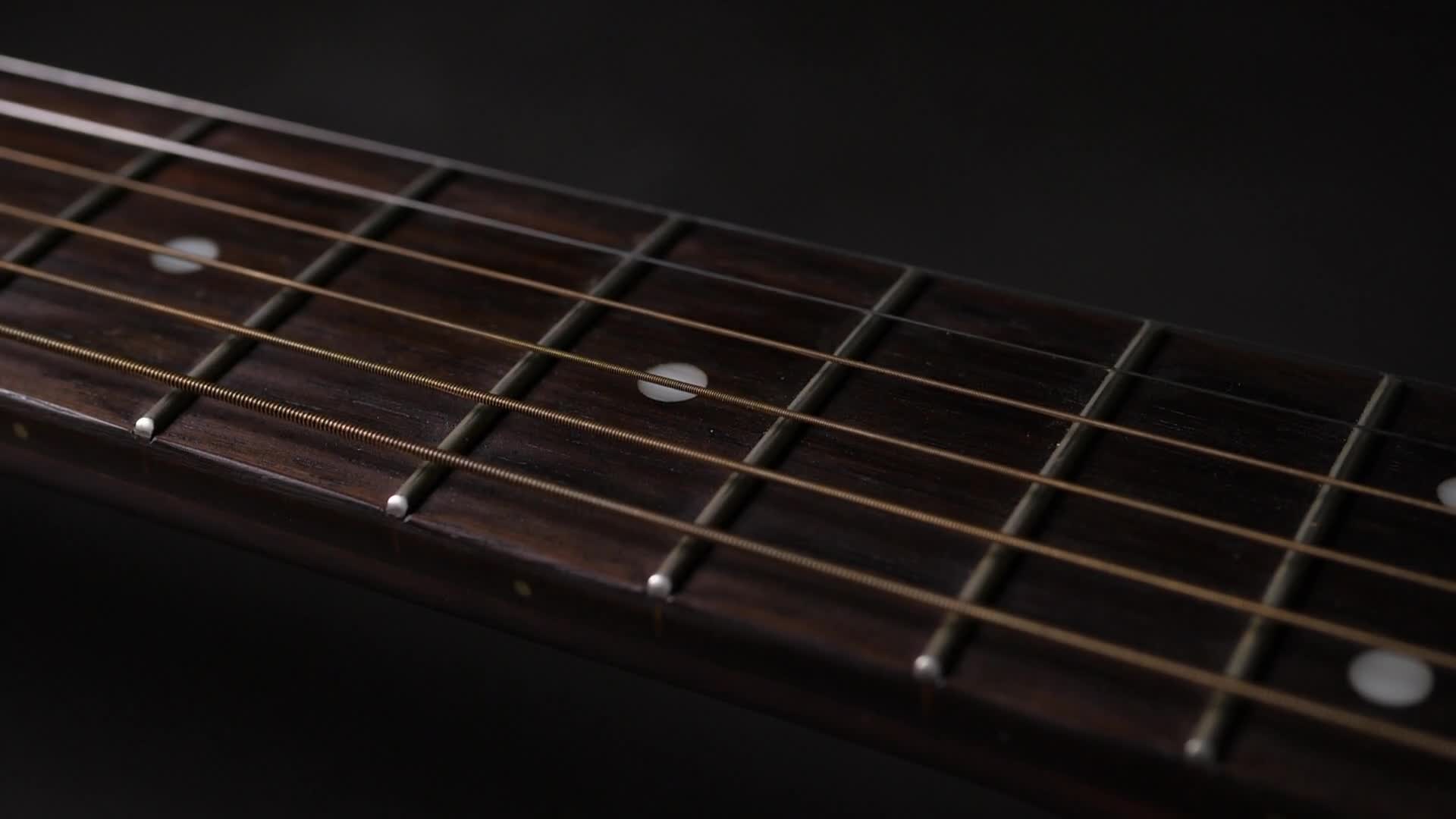 Vibrating string of an acoustic guitar 1806636 Stock Video at Vecteezy