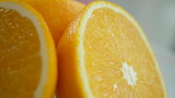 Orange fruit slice in slow motion video