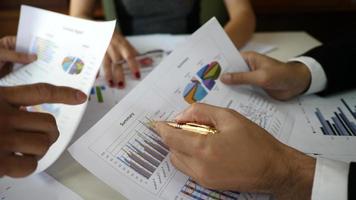 Businessmen in a meeting discussing results as a team. video