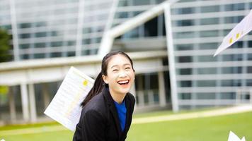 Business girl jumping around celebrating her success.  video