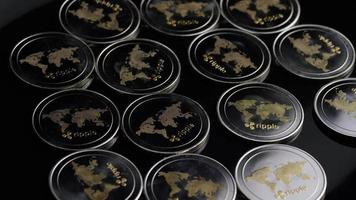 Rotating shot of Bitcoins digital cryptocurrency - BITCOIN RIPPLE 0130 video