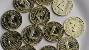Rotating shot of Litecoin Bitcoins digital cryptocurrency - BITCOIN LITECOIN 0001 video