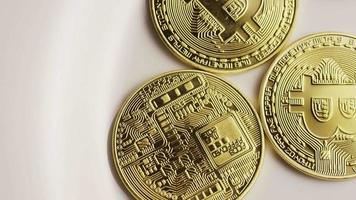 Rotating shot of Bitcoins digital cryptocurrency - BITCOIN 0155 video