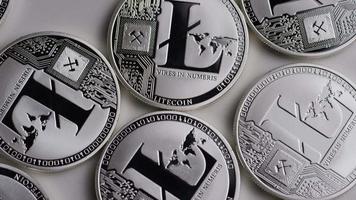 Rotating shot of Litecoin Bitcoins digital cryptocurrency - BITCOIN LITECOIN 0109 video