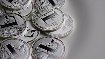 Rotating shot of Litecoin Bitcoins digital cryptocurrency - BITCOIN LITECOIN 0175 video