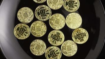 Rotating shot of Bitcoins digital cryptocurrency - BITCOIN 0495 video