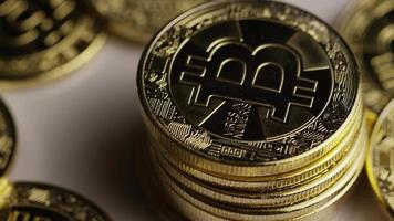 Rotating shot of Bitcoins digital cryptocurrency - BITCOIN 0431 video