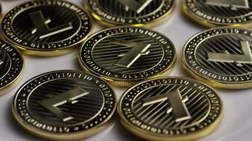 Rotating shot of Litecoin Bitcoins digital cryptocurrency - BITCOIN LITECOIN 0009 video