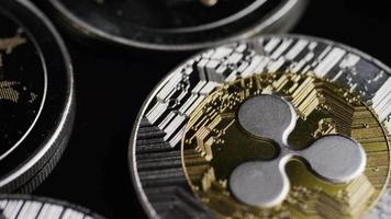 Rotating shot of Bitcoins digital cryptocurrency - BITCOIN RIPPLE 0170 video