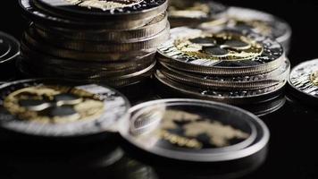 Rotating shot of Bitcoins digital cryptocurrency - BITCOIN RIPPLE 0211 video