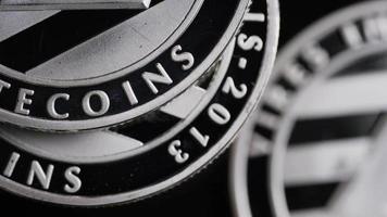 Rotating shot of Bitcoins digital cryptocurrency - BITCOIN LITECOIN 369 video