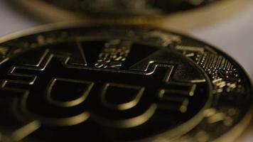 Rotating shot of Bitcoins digital cryptocurrency - BITCOIN 0372 video