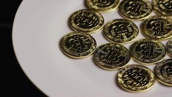 Rotating shot of Bitcoins digital cryptocurrency - BITCOIN 0259 video