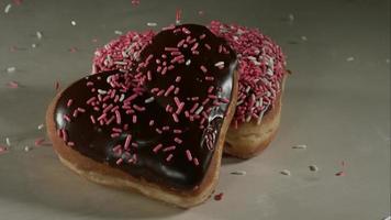 Doughnuts falling and bouncing in ultra slow motion 1,500 fps on a reflective surface - DOUGHNUTS PHANTOM 020 video