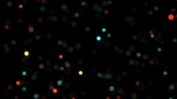 Videoclip de fondo de bucle de luces de partículas de bokeh colorido brillante