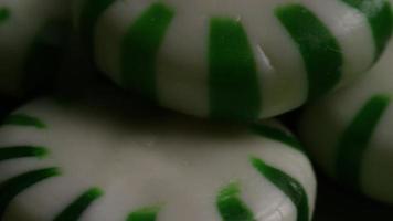 Rotating shot of spearmint hard candies - CANDY SPEARMINT 051 video