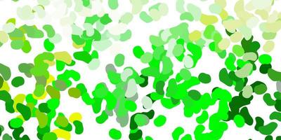 Light green, yellow vector pattern with abstract shapes.