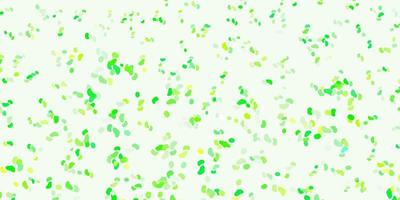 Light green, yellow vector backdrop with chaotic shapes.