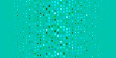 Light Blue, Green vector background in polygonal style.