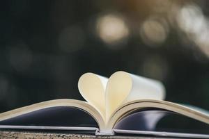 Open book with heart shape photo