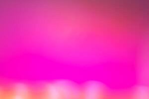 A pink and purple background with blurred lights photo