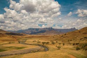 Brown mountains under a blue sky photo