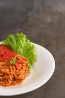 Italian spaghetti pasta with tomato sauce photo