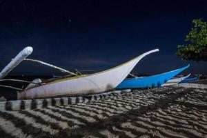 Boats on the seashore photo