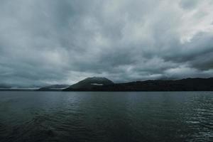 Dark sky above a body of water photo