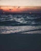 Seashore at sunset photo