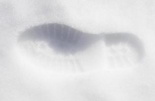 Footprint in snow photo
