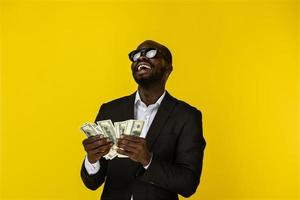 Cool man holding a lot of money photo